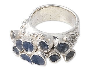 Design Idea B 5 0 P - Silver art clay ring features cup-like protuberances with dark blue centers.