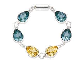 Design Idea Q J 4 H - Silver bracelet has links featuring six large teardrop-shaped settings for blue and gold crystals.