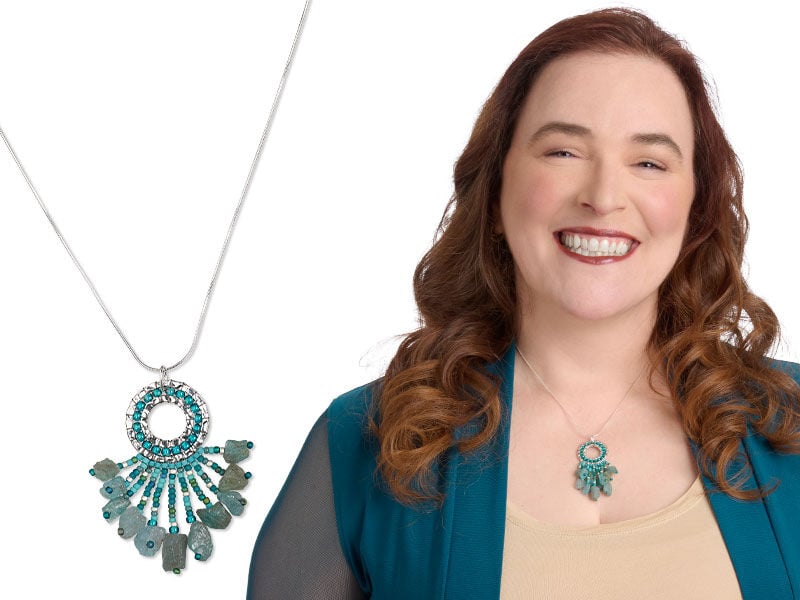 Model wearing a western themed necklace 