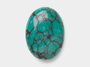 An image of a turquoise cabochon