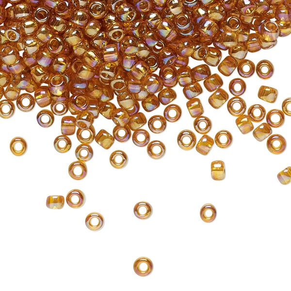 Seed bead, TOHO BEADS&reg;, glass, pkg/250g, #8 round, translucent rainbow topaz (TR-08-162C). image number 0