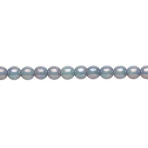 Bead, Czech glass druk, opaque light green nebula, 4mm round. Sold per 15-1/2" to 16" strand.