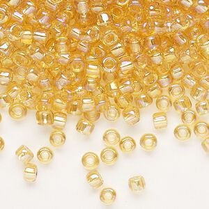 Seed bead, Dyna-Mites&trade;, glass, transparent rainbow amber yellow, #6 round. Sold per 40-gram pkg.