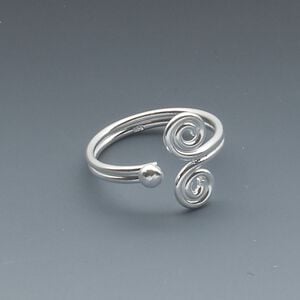 Toe ring, sterling silver, 12mm wide with double swirl design, adjustable. Sold individually.