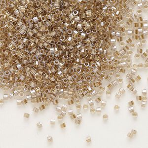 Seed bead, Delica&reg;, glass, pkg/7.5g, #11 cut, translucent beige-lined luster crystal clear (DBC-0907).