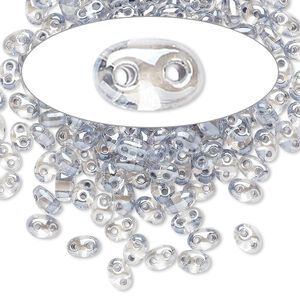 Seed bead, Preciosa Twin&trade; Czech glass, pkg/10g, 5x2.5mm oval, transparent light grey terra color-lined clear, (38642).