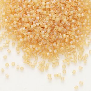 Seed bead, Delica&reg;, glass, pkg/50g, #11 round, translucent matte rainbow light topaz (DB-0852).