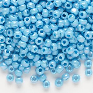 Seed bead, Dyna-Mites&trade;, glass, opaque rainbow light turquoise blue, #6 round. Sold per 1/2 kilogram pkg.