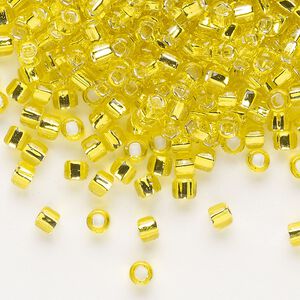 Seed bead, Dyna-Mites&trade;, glass, silver-lined translucent yellow, #6 round with square hole. Sold per 40-gram pkg.