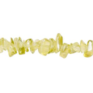 Bead, glass, translucent yellow-green AB, medium chip with 0.6-0.8mm hole. Sold per 32-inch strand, approximately 290-320 beads.