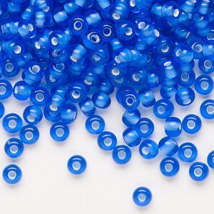 Seed bead, Preciosa Ornela, glass, transparent chalkwhite-lined sapphire, #6 rocaille. Sold per 500-gram pkg.