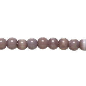 Bead, cat's eye glass (fiber optic glass), purple, 5mm-7mm irregular round. Sold per 14-inch strand, approximately 75 beads.