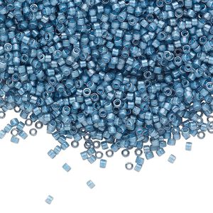Seed bead, Delica&reg;, glass, pkg/7.5g, #11 round, translucent luminous inside dyed color dusk blue (DB-2054).