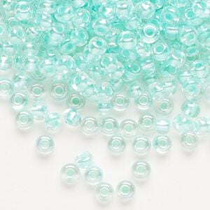 Seed bead, Preciosa Ornela Czech glass, pkg/500g, #6 rocaille, translucent color-lined luster pastel green, (382PG).