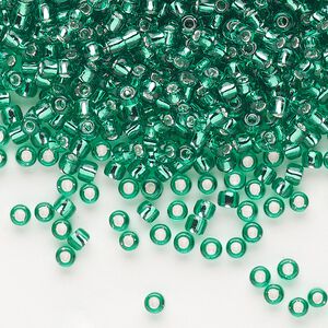 Seed bead, Dyna-Mites&trade;, glass, silver-lined translucent jade green, #8 round. Sold per 1/2 kilogram pkg.