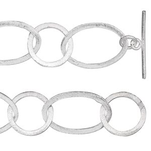 Chain, brushed silver-plated copper, 18mm long and short flat oval, 36 inches with toggle clasp. Sold individually.