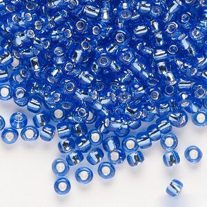 Seed bead, Dyna-Mites&trade;, glass, transparent silver-lined light blue, #6 round. Sold per 40-gram pkg.