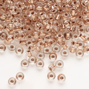 Seed bead, Preciosa Ornela Czech glass, pkg/500g, #6 rocaille, transparent copper-lined clear, (68105).