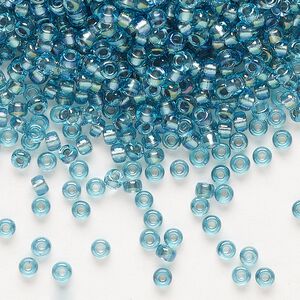 Seed bead, Miyuki, glass, pkg/50g, #8 rocaille, translucent dusk-lined luster crystal clear (RR-1824).