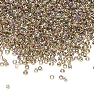 Seed bead, TOHO BEADS&reg;, glass, pkg/7.5g, #11 round, translucent gold-lined rainbow crystal clear (TR-11-994).