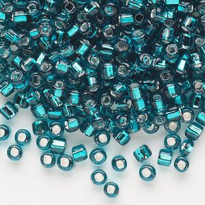 Seed bead, Dyna-Mites&trade;, glass, silver-lined translucent teal blue, #6 round with square hole. Sold per 40-gram pkg.