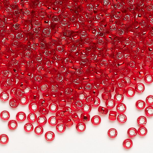 Seed bead, Dyna-Mites&trade;, glass, silver-lined translucent red, #8 round. Sold per 1/2 kilogram pkg. image number 0
