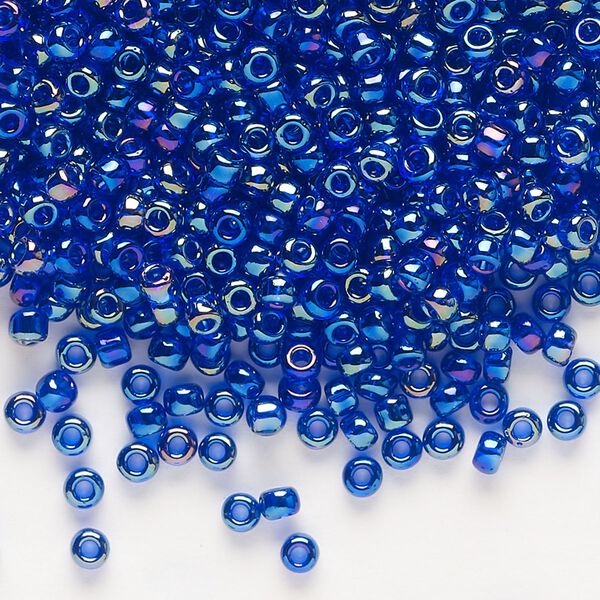 Seed bead, Dyna-Mites&trade;, glass, transparent rainbow iris blue, #8 round. Sold per 1/2 kilogram pkg. image number 0