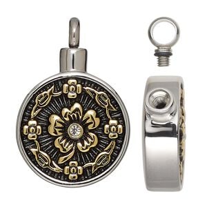 Pendant, gold-finished stainless steel / glass / silicone / enamel, black and clear, 36x24mm round with flower design and watertight chamber. Sold individually.