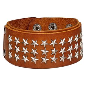 Bracelet, leather (dyed) with silver-plated steel and "pewter" (zinc-based alloy), tan, 41mm wide with star studs, adjustable from 5-1/2 to 7 inches with double snap closure. Sold individually.