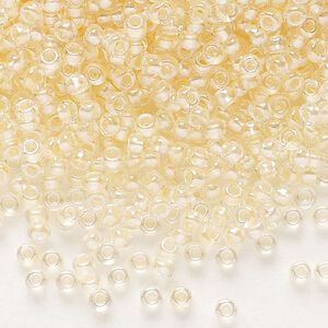 Seed bead, Preciosa Ornela Czech glass, pkg/50g, #11 rocaille, translucent color-lined luster pastel apricot, (382PA).