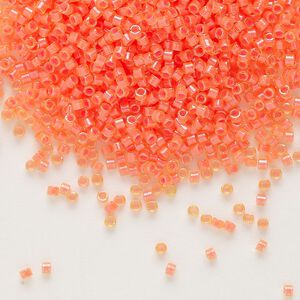 Seed bead, Delica&reg;, glass, pkg/7.5g, #11 round, translucent luminous inside dyed color orange (DB-2047).