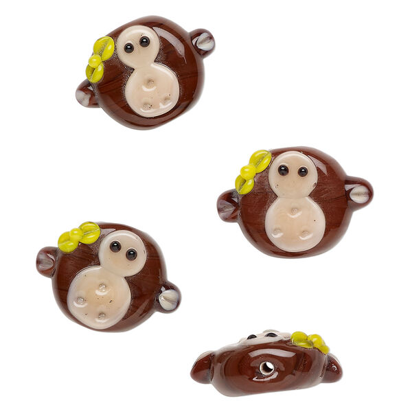 Bead, lampworked glass 1pkg4, opaque brown / peach / yellow, 28x20mm monkey head. image number 0