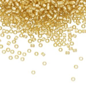 Seed bead, TOHO BEADS&reg;, glass, pkg/50g, #11 round, translucent silver-lined frosted light topaz (TR-11-22F).