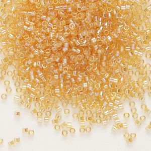 Seed bead, Delica&reg;, glass, pkg/7.5g, #11 round, translucent rainbow light topaz (DB-0100).