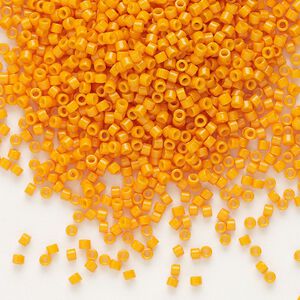 Seed bead, Delica&reg;, glass, pkg/50g, #11 round, Duracoat&reg; opaque outside dyed mango (DB-2104).