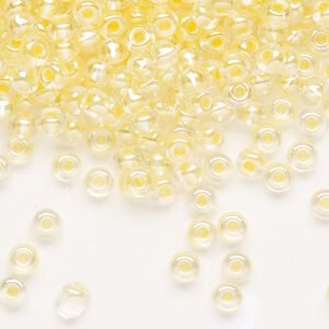 Seed bead, Preciosa Ornela Czech glass, pkg/50g, #6 rocaille, translucent color-lined luster pastel yellow, (382PY).