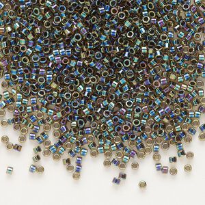 Seed bead, Delica&reg;, glass, pkg/50g, #11 round, translucent blue-lined rainbow light topaz (DB-0089).