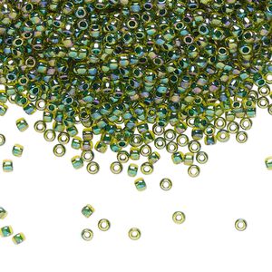 Seed bead, TOHO BEADS&reg;, glass, pkg/7.5g, #11 round, translucent rainbow forest green-lined jonquil (TR-11-1829).