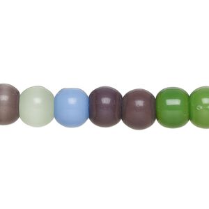 Bead, cat's eye glass, opaque mixed colors, 7mm irregular round, economy grade. Sold per 15-inch strand.
