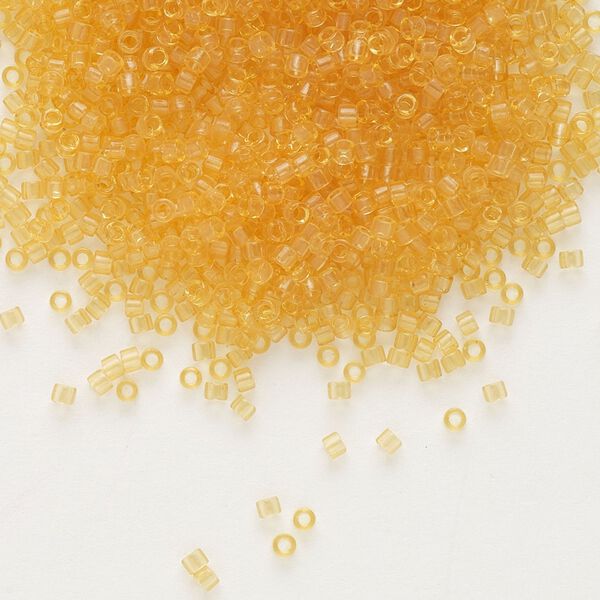 Seed bead, Delica&reg;, glass, pkg/50g, #11 round, transparent light topaz (DB-0702). image number 0