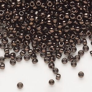 Seed bead, Dyna-Mites&trade;, glass, opaque iris dark bronze, #8 round. Sold per 40-gram pkg.