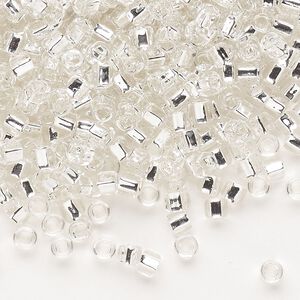 Seed bead, Dyna-Mites&trade;, glass, silver-lined translucent clear, #6 round with square hole. Sold per 40-gram pkg.