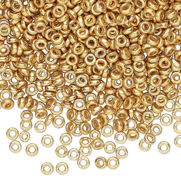 Seed bead, Miyuki, glass, pkg/250g, 3x1.3mm spacer rondelle, opaque gold finish, (SPR3-4202). image number 0