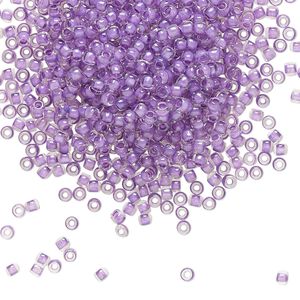 Seed bead, TOHO BEADS&reg;, glass, pkg/50g, #11 round, translucent wisteria-lined crystal clear (TR-11-935).