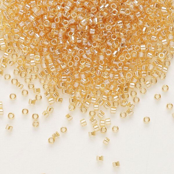 Seed bead, Delica&reg;, glass, pkg/50g, #11 round, translucent luster light topaz (DB-0099). image number 0