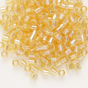 Seed bead, Delica&reg;, glass, pkg/7.5g, #8 round, translucent rainbow light topaz (DBL-0100).
