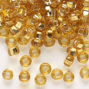 Seed bead, Preciosa Ornela, glass, transparent silver-lined topaz, #2 rocaille with square hole. Sold per 50-gram pkg.