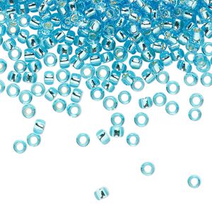 Seed bead, TOHO BEADS&reg;, glass, pkg/7.5g, #8 round, transparent silver-lined aquamarine (TR-08-23).