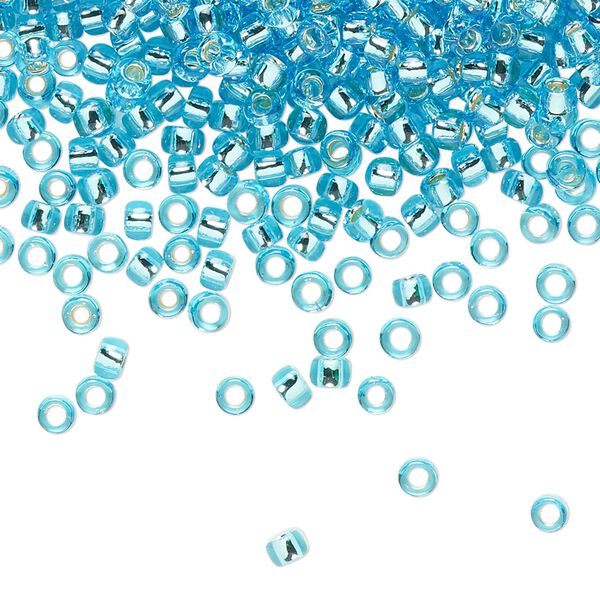 Seed bead, TOHO BEADS&reg;, glass, pkg/7.5g, #8 round, transparent silver-lined aquamarine (TR-08-23). image number 0