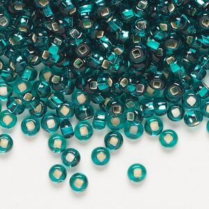 Seed bead, Preciosa Ornela Czech glass, pkg/500g, #6 rocaille, transparent silver-lined teal, (57710).